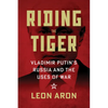 Riding the Tiger: Vladimir Putin's Russia and the Uses of War - Hardcover